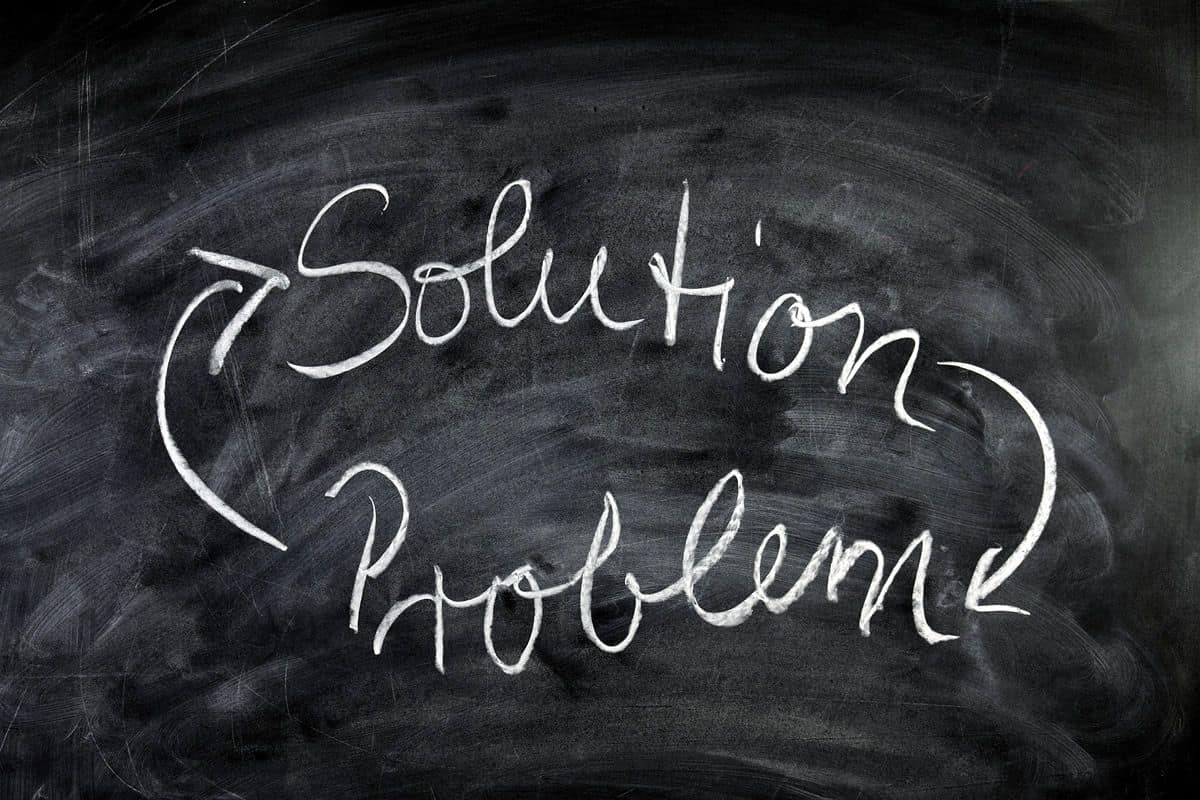 Problem and solution presented as a cycle on a chalkboard, representing how a great app description explains a user problem and presents the app as a solution
