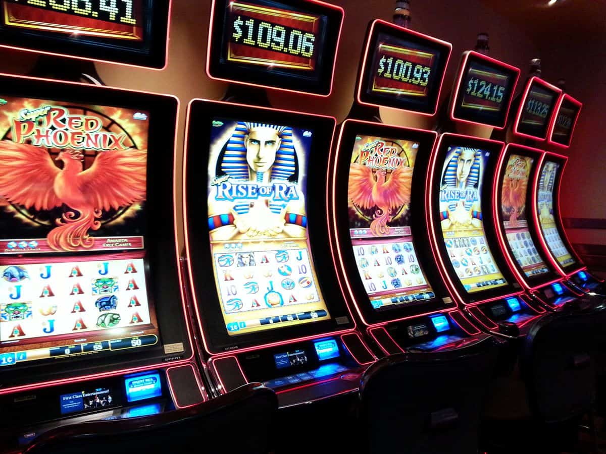 A photo of a row of six slot machines.