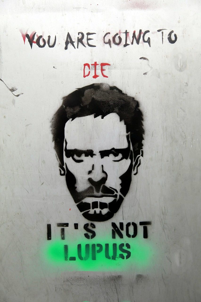 A street art of the main character Dr House from American TV series House by Fox. The text says “You are going to die, it’s not Lupus.”