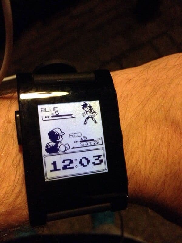 A close-up of a Pebble Watch face that resembles a screen from one of the original Pokemon games.