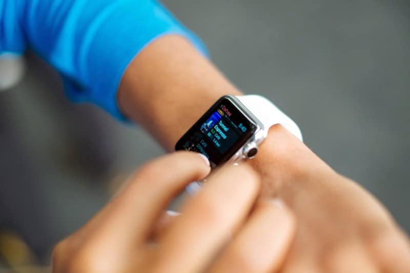 Close up image of person using gesture controls on the Apple Watch.