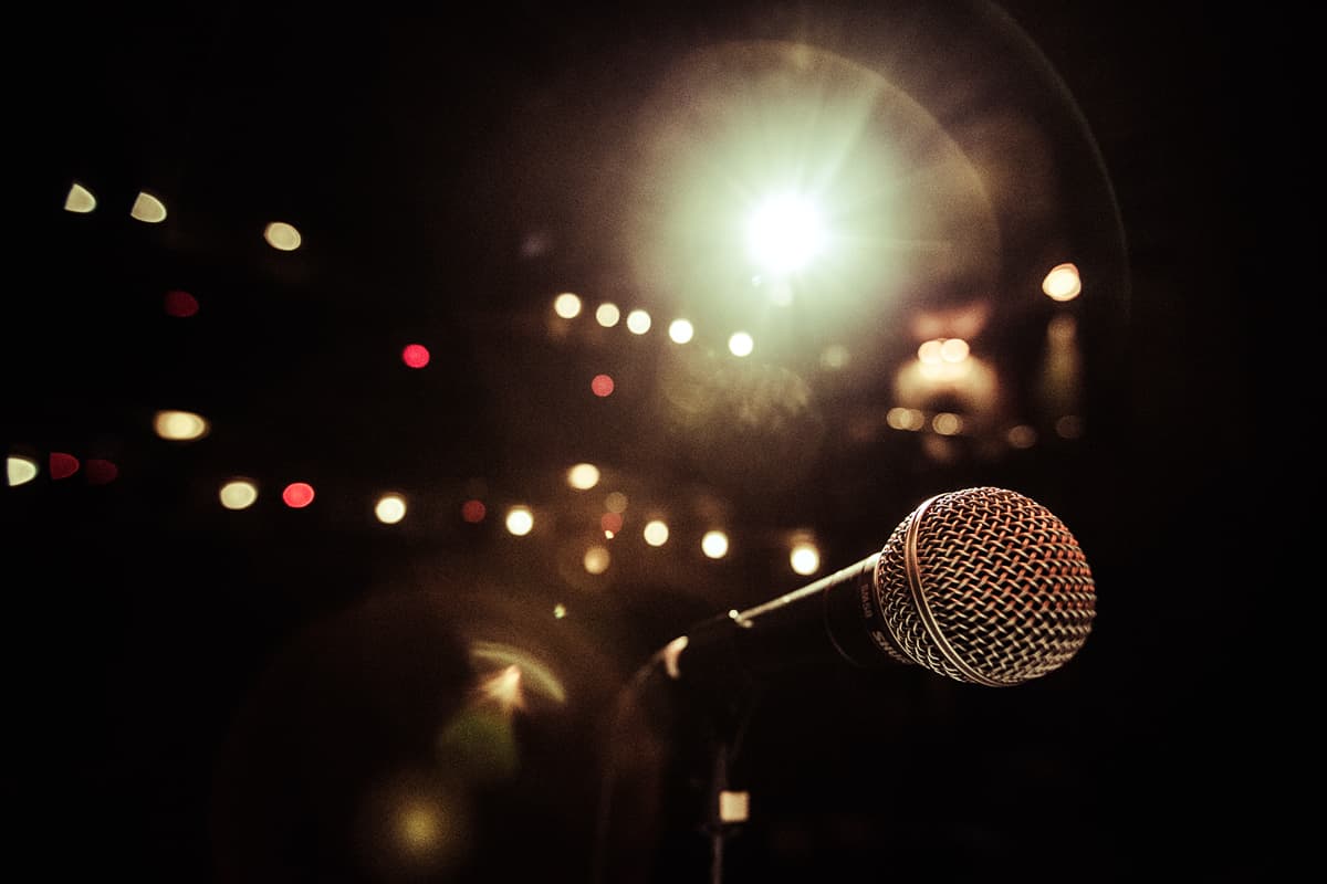 Photo of an open mic on stage at a storytelling event held by The Moth.
