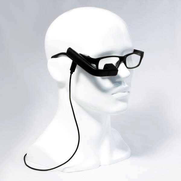 A photo of a mannequin head wearing a black Vufine mounted on a pair of glasses.