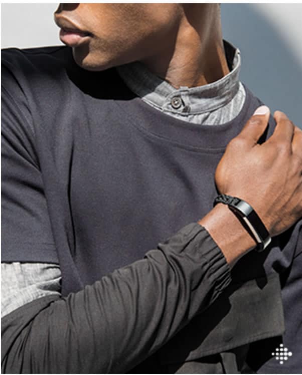 Image of a man wearing the Fitbit Alta designer collection with Public School.