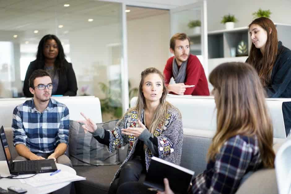 Image of a group of colleagues in a discussion.