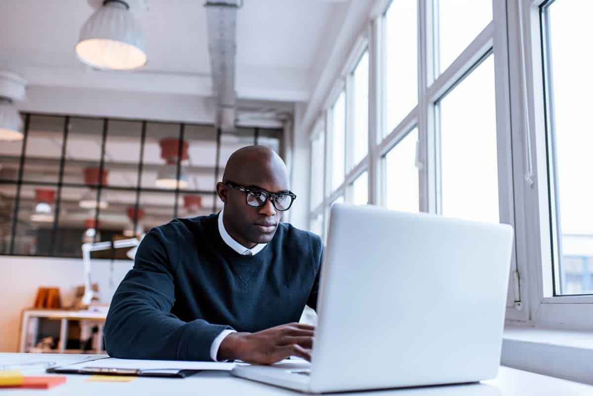 A businessman working on his laptop.