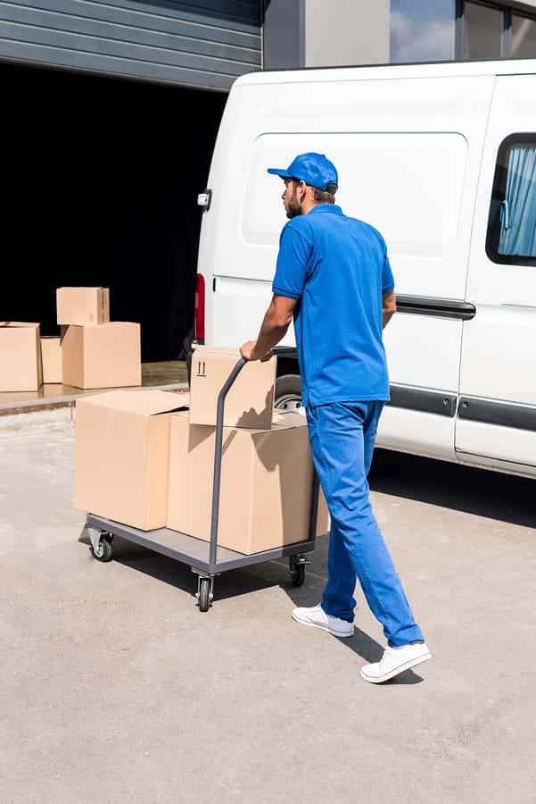 Delivery driver with parcels.