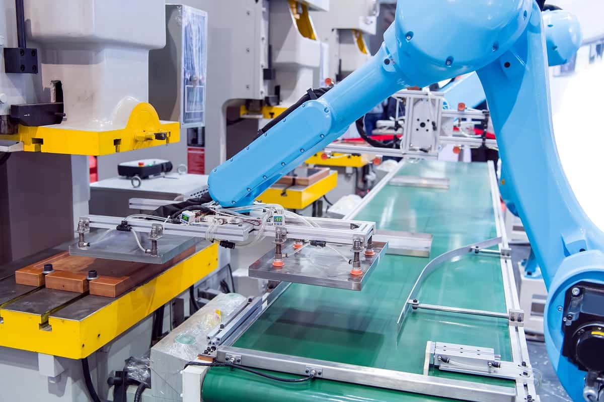 Factory robots assembling products.