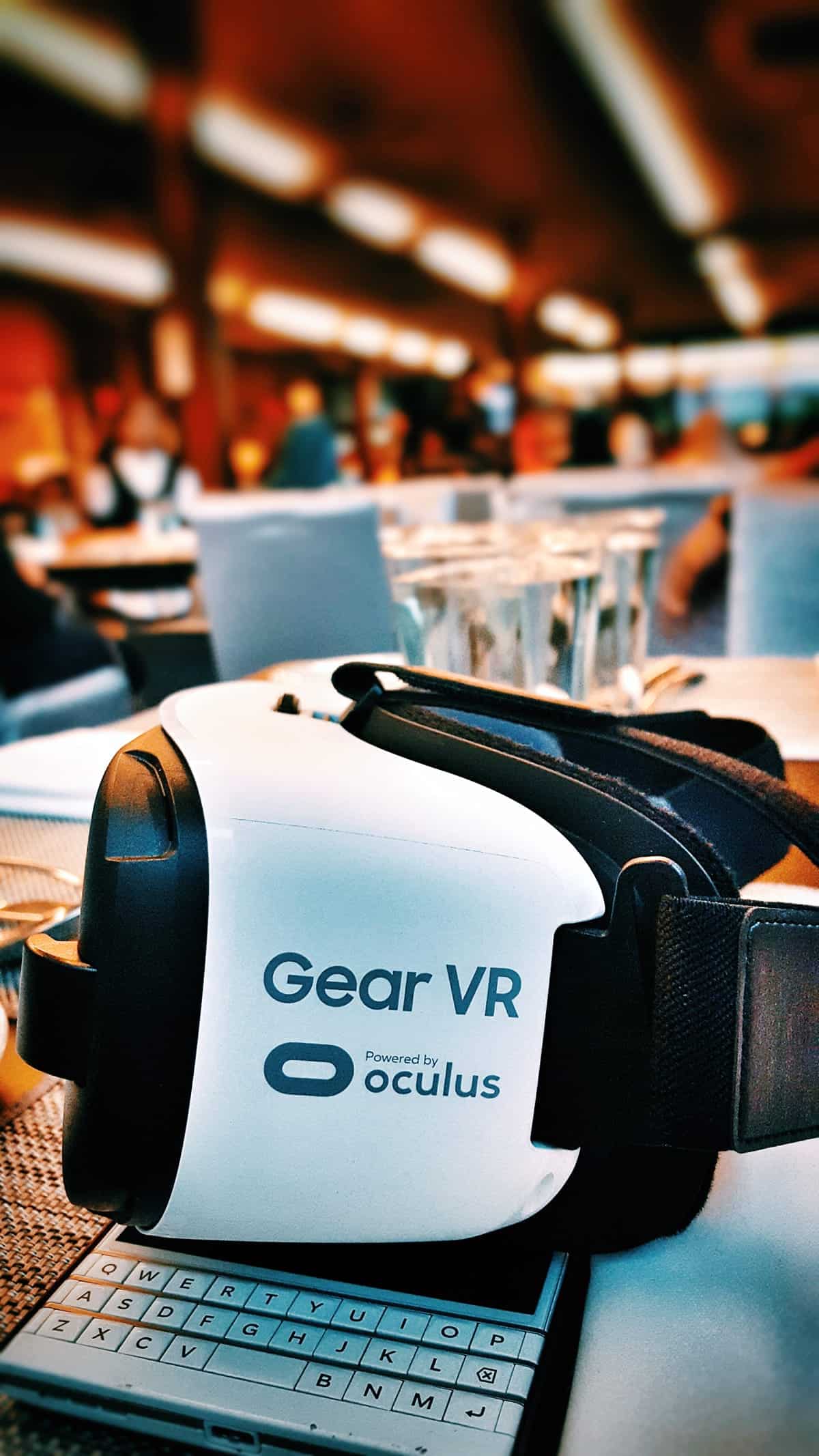 A photo of an Oculus VR headset sitting on a table.