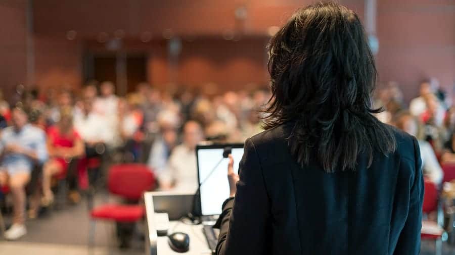 A photo of a speaker’s point of view at the front of a lecture hall.