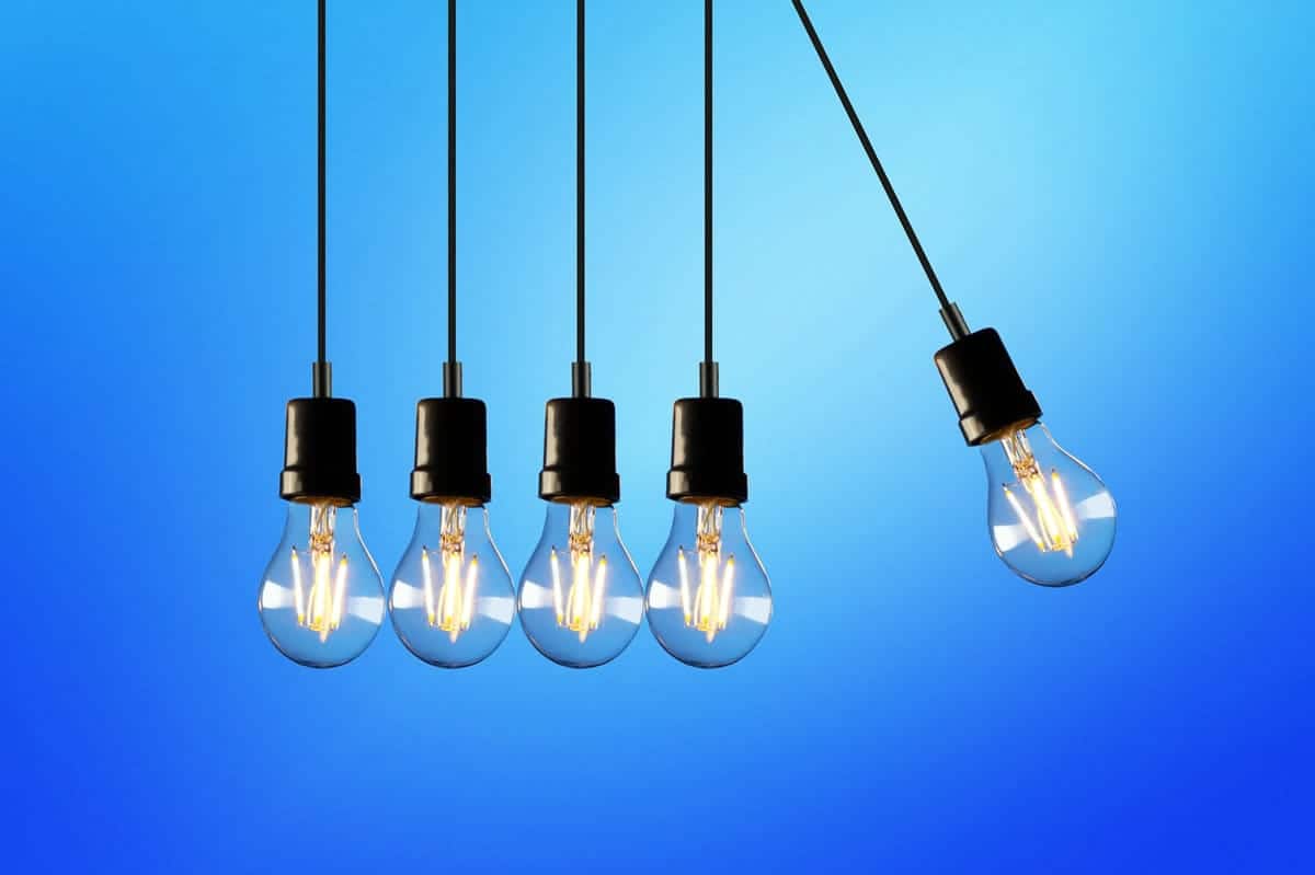 Five lightbulbs on a blue background.