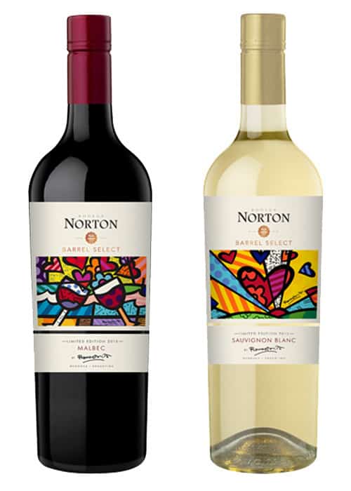 A side-by-side photo of the Malbec and Sauvignon Blanc bottles designed by Romero Britto.